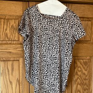 Ann Taylor blouse size medium. Black print on an “almost soft pink” background.